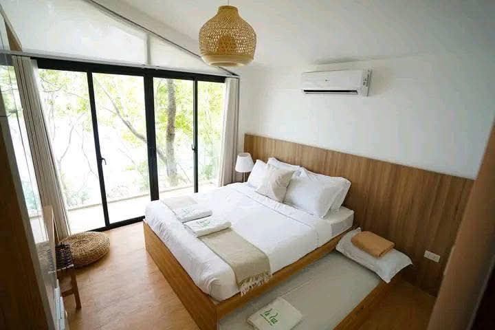 Luxury pool villa 5-BR bed 4 at La Luz Beach Resort